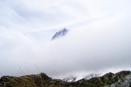 Rock snow fog photo