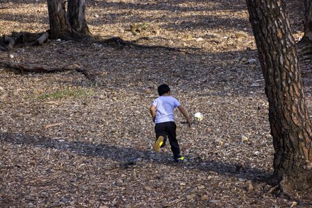 Child playing ball