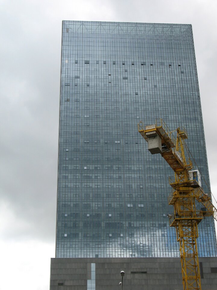 Contrast building dark clouds