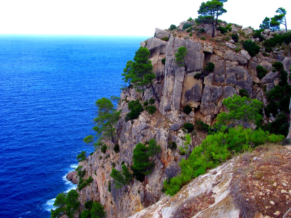 Sea blue water rock photo