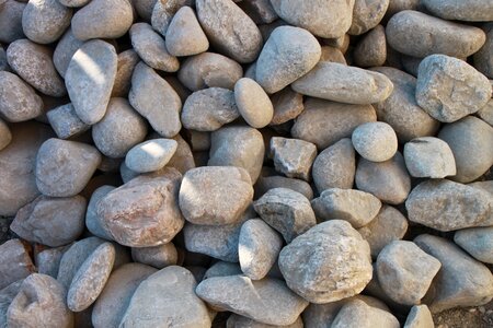 Pile rocks round