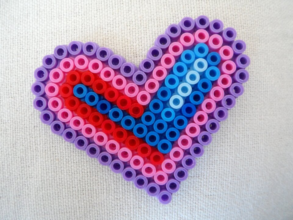Ironing beads beads child