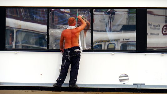 Ship window cleaning sailor photo