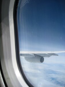 Cloud aircraft wing photo