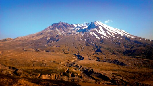 Snow active stratovolcano photo