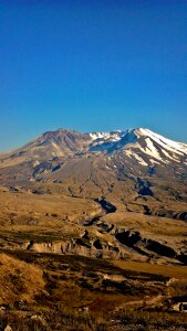 Snow active stratovolcano photo