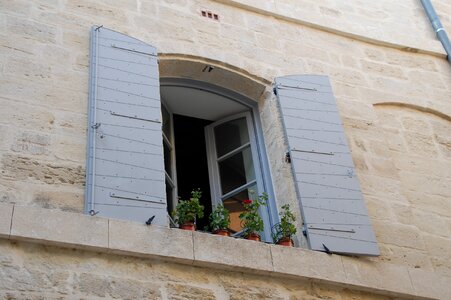 Window shutters open facade