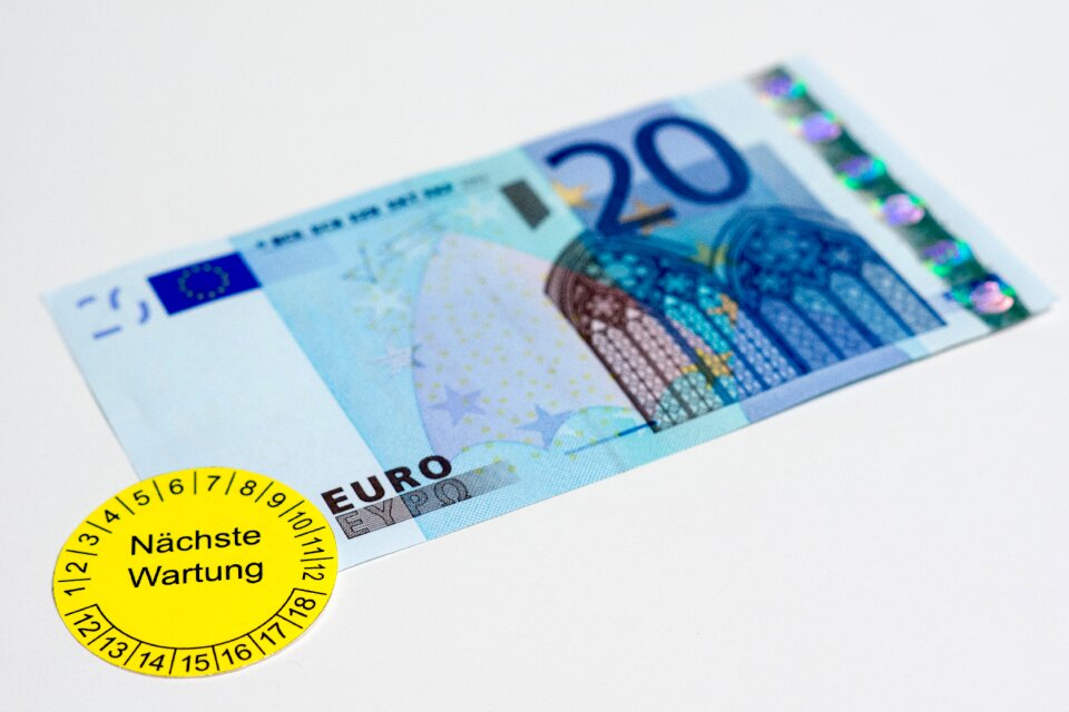 Maintenance sticker dollar bill repair