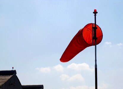 Blue sky hanger roof blowing