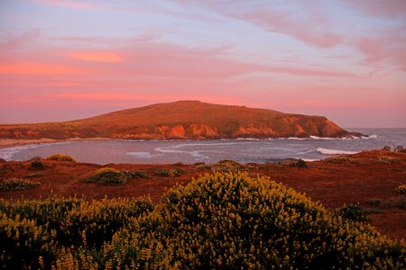 Ocean mountain sunset photo