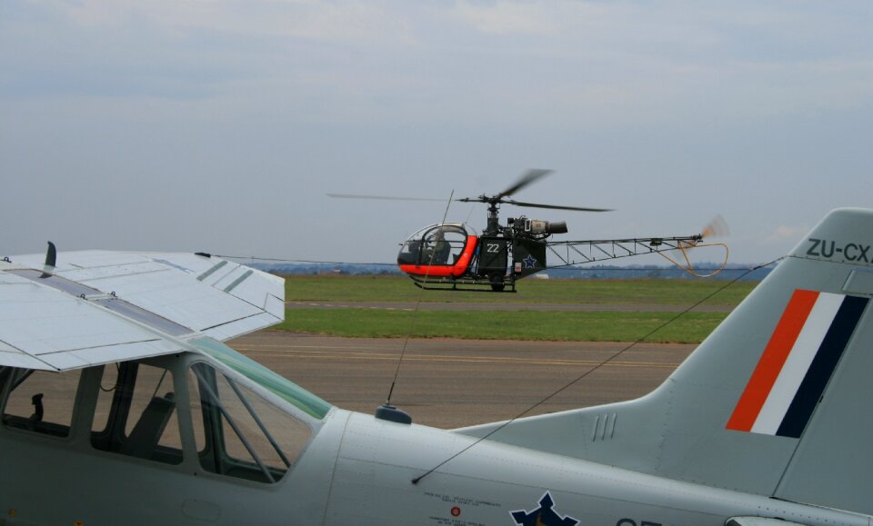 Overcast sky aermacchi aerospatiale allouette ll heli