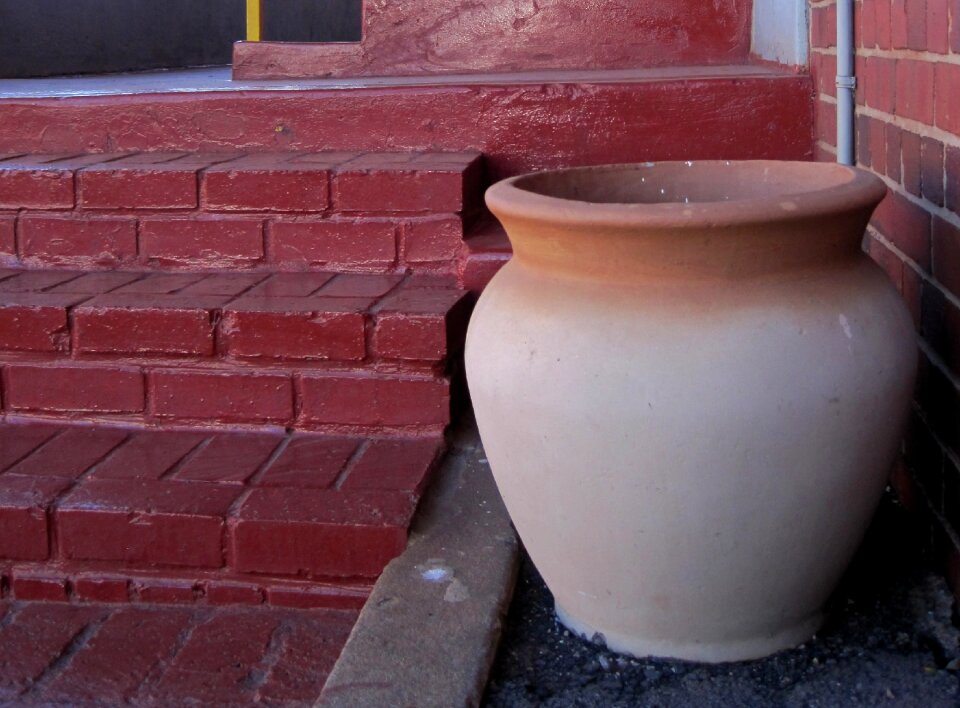 Cream colored terracotta edge red steps