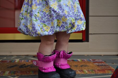 Pink waiting rain boots