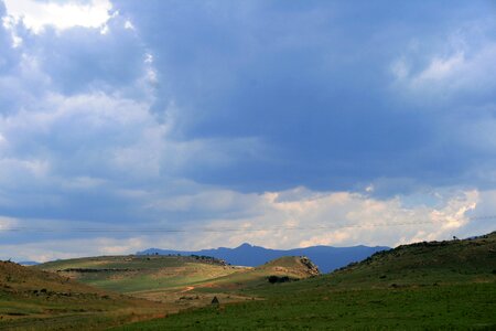 Far blue mountains overcast sky