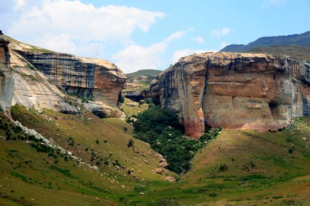 Layered earthy colors slopes green