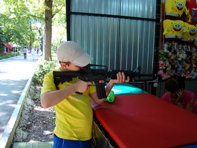 Boy target shoots