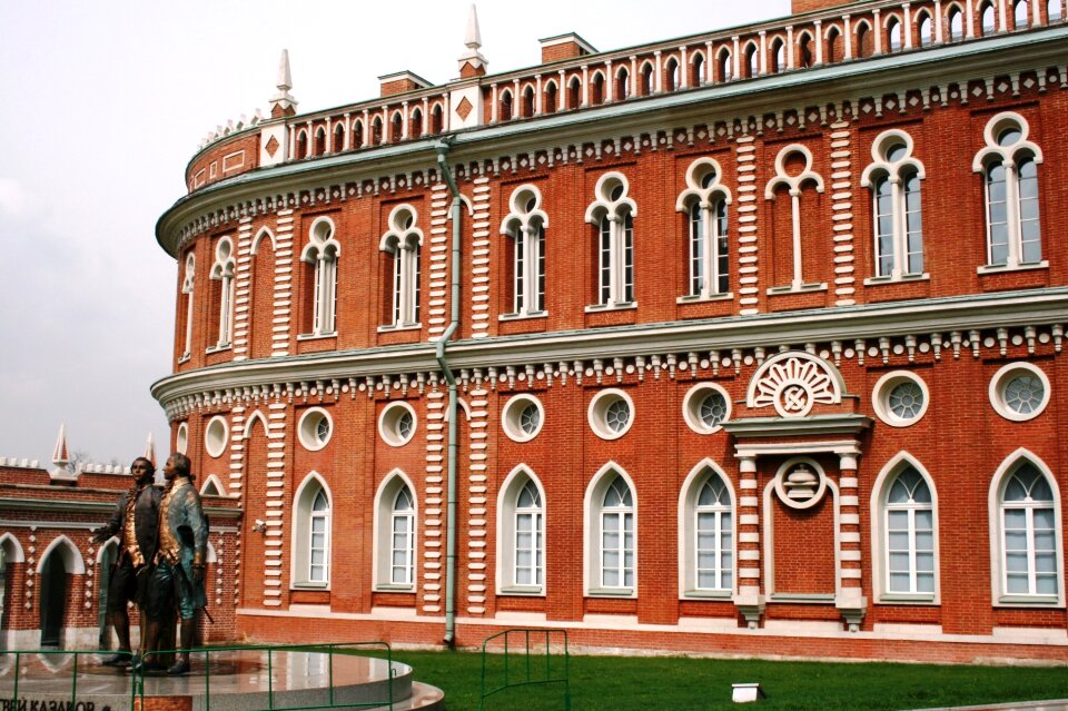 Red brick windows statues