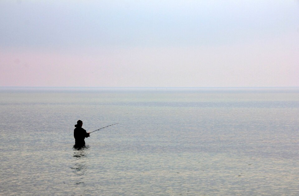 Angler fishing wide