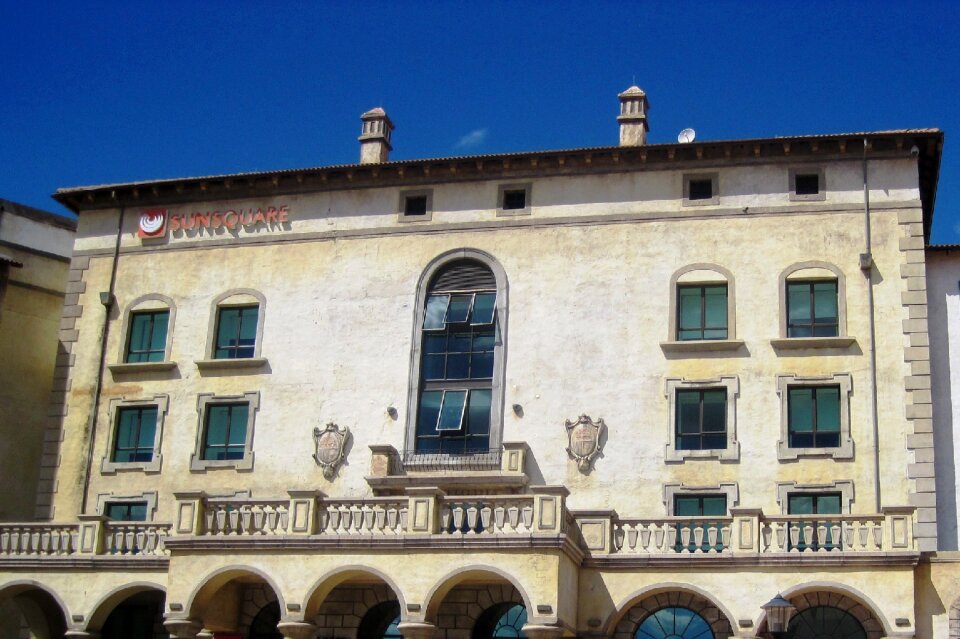 Naples yellow-white weathered windows photo