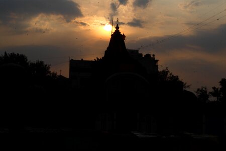 Indian temple black clouds photo