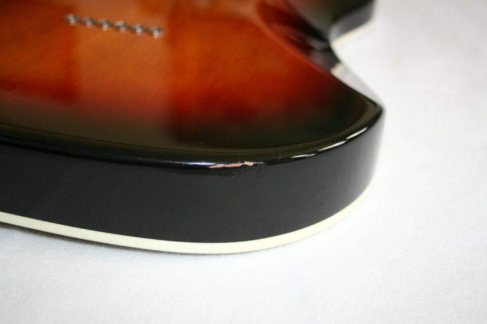 Damaged veneer chipped