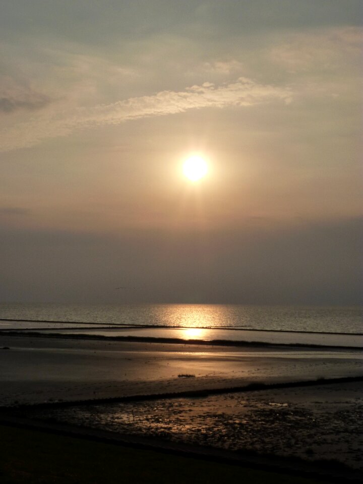 Setting sun sunset water