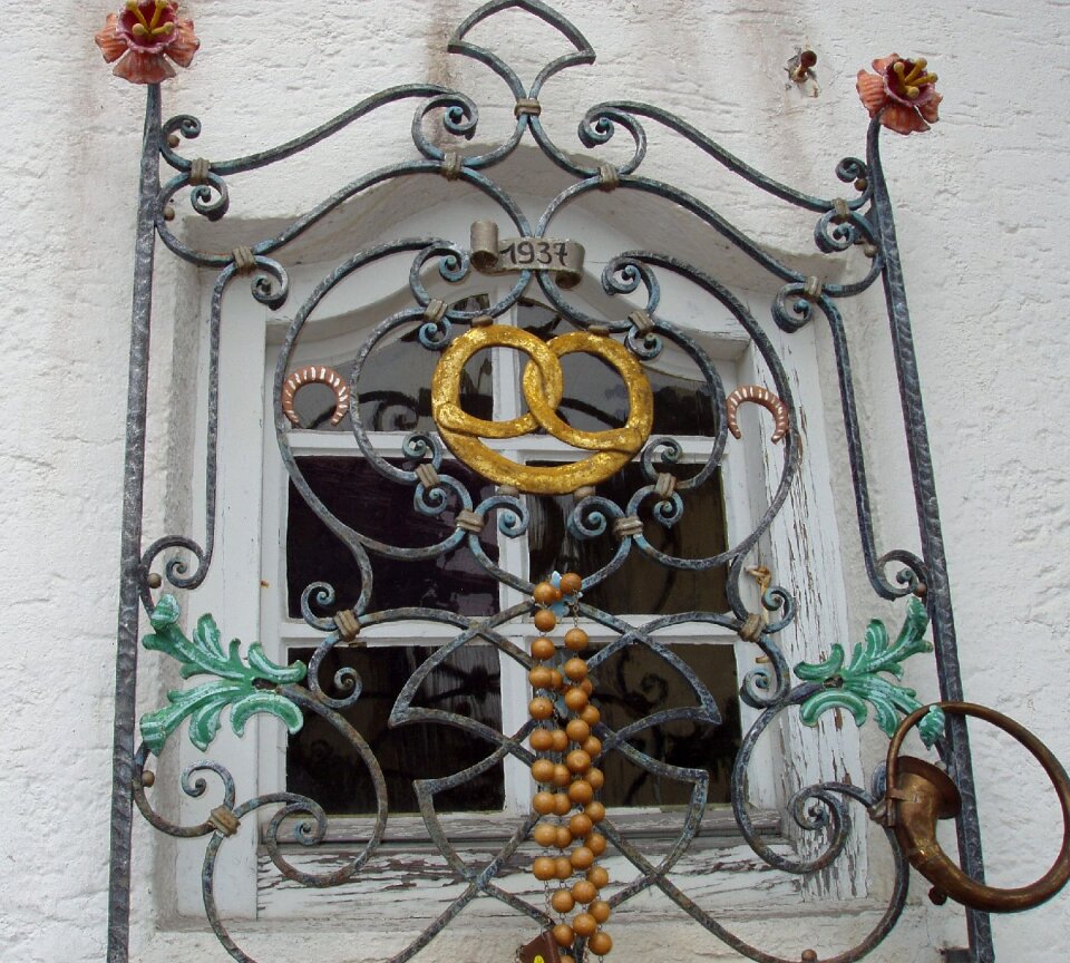 Curlicue wrought iron window grilles