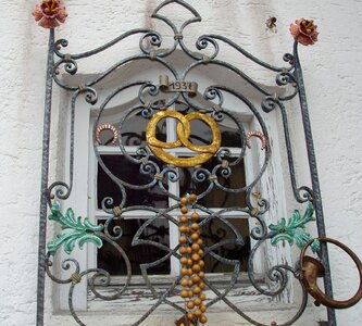 Curlicue wrought iron window grilles