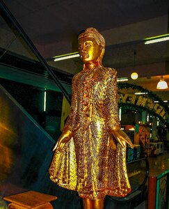 Golden lady figurine sculpture sparkle