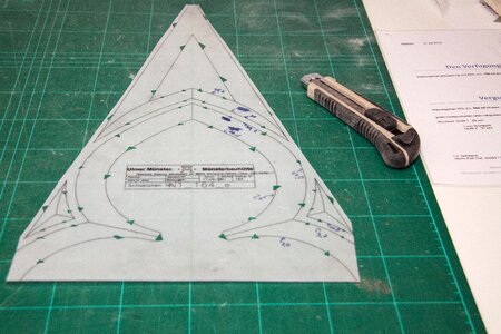 Green triangles transferred to the surface of the stone transparent paper
