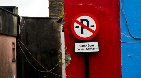 Parking sign red blue