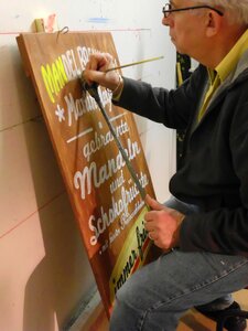 Sign painter wooden sign free images