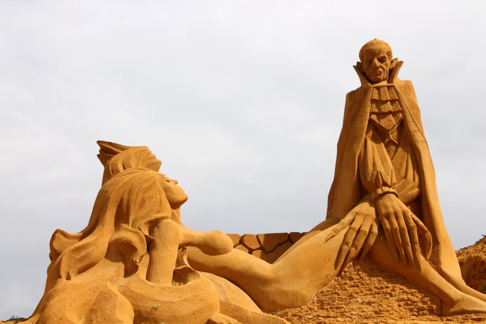 Sand statue of dog dracula