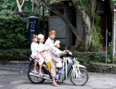 Bali temple festival motorcycle photo