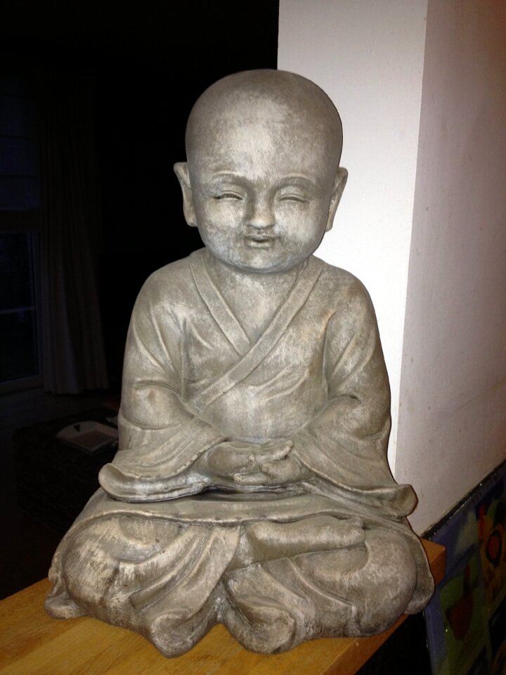 Meditation sitting statue