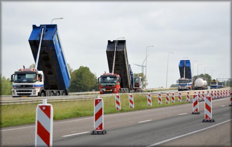 Trucks cars road