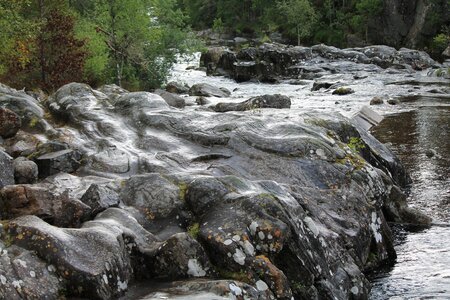 Waterfall river stones photo