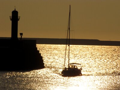 Lighthouse sunset sea