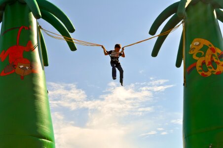 Kid jumping bungee jumping