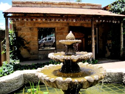 Quaint slanting roof fountain
