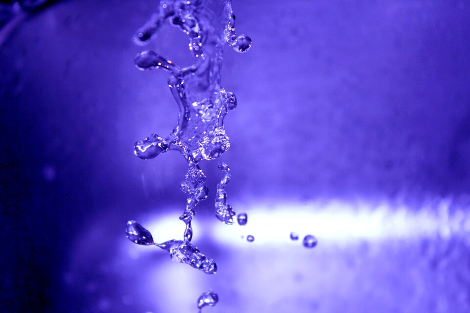 Water liquid violet background