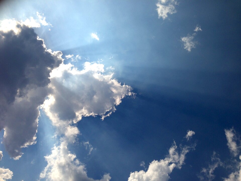 Sun clouds blue