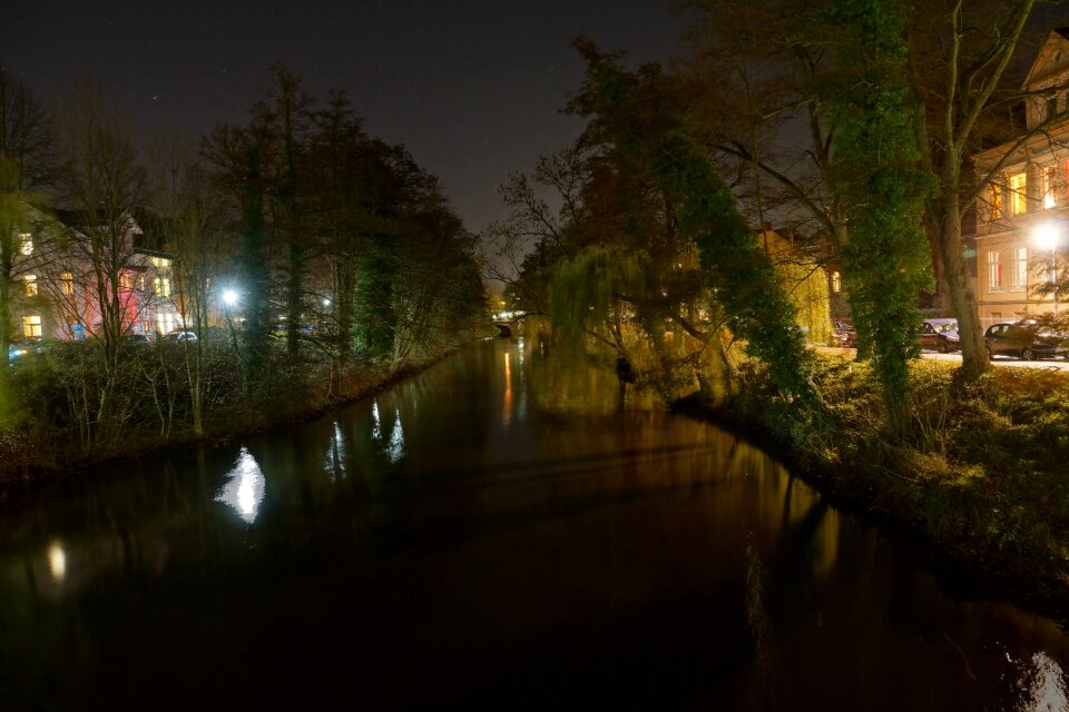 Night photograph in stade on the castle moat