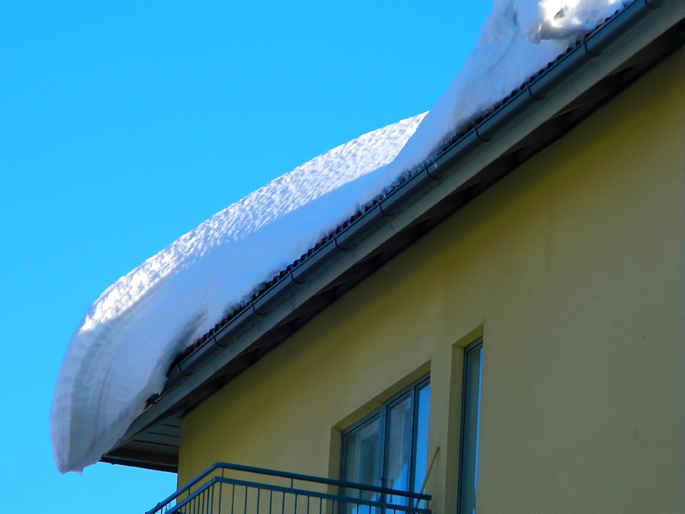 House building on the roof photo