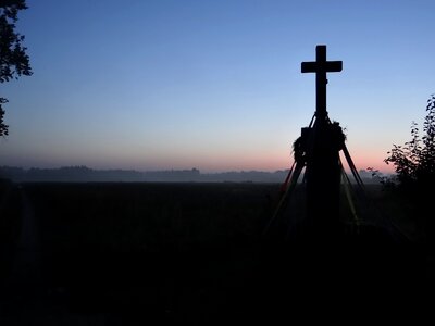 Cross dawn the silhouette