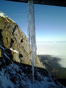 Mountains sea of fog deep mist photo