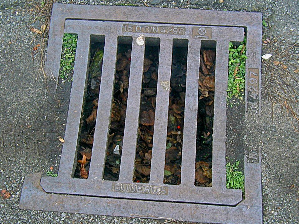 Sewage system lid metal