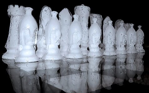 Chess pieces ice frozen photo