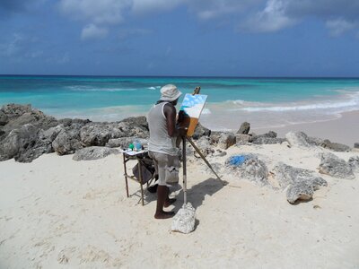 Beach painter painting photo