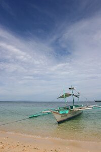 Sunset whet is the only boat republic of the philippines photo